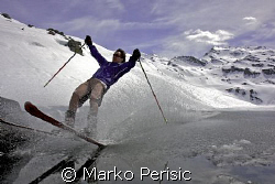 This time a skier takes a run at Lac De Lou in the french... by Marko Perisic 